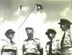 Wing Commander J. R. Gordon with members of the WAAAF.