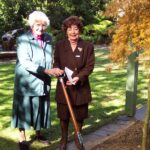 Planting a Japanese maple, gift of Ladies Drawing Room to University House in its Jubilee Year 2004
